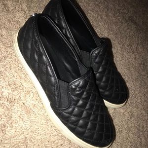 Steve Madden Black quilted slip ons